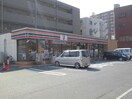 セブンイレブン八幡筒井町店(コンビニ)まで450m グリ－ンパ－ク三共(502)