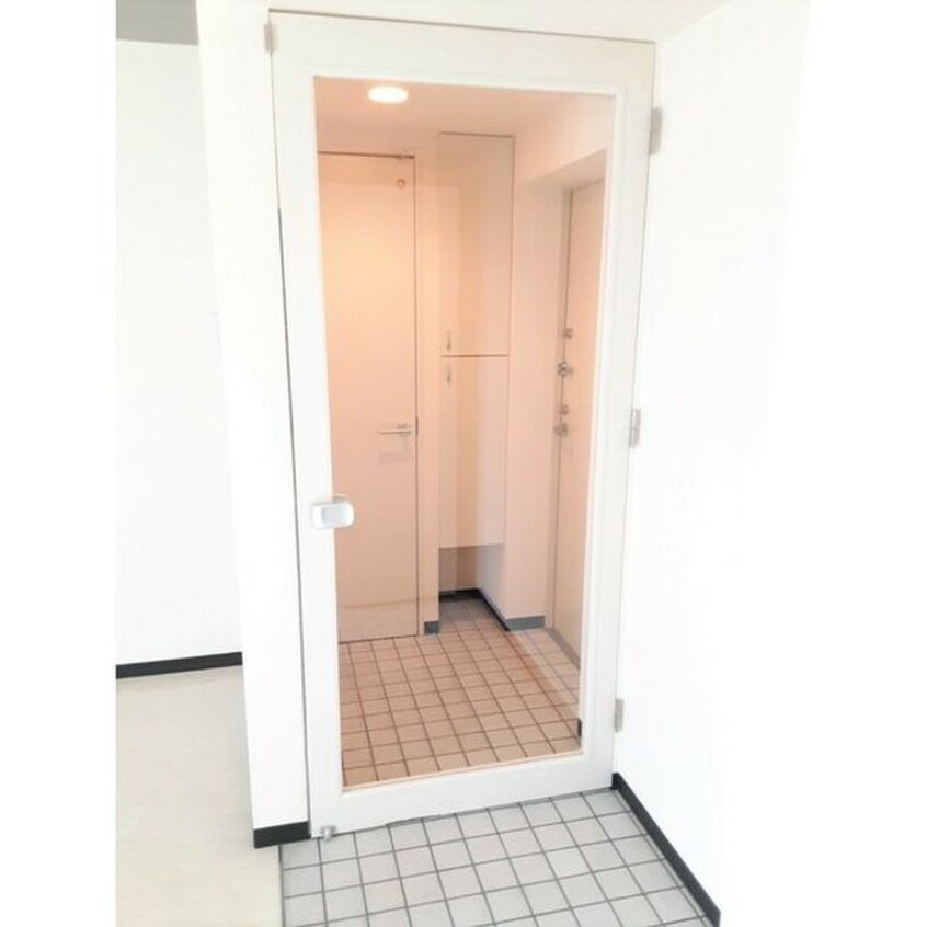 玄関 ドゥエ　カーサ　コモド