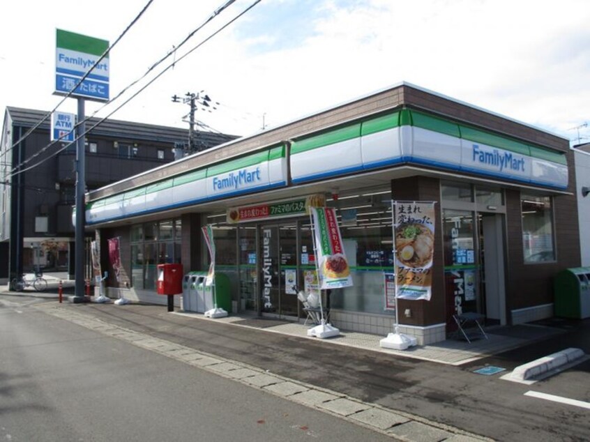 ファミリーマート　旭丘堤2丁目店(コンビニ)まで934m 黒松ＳＴビル