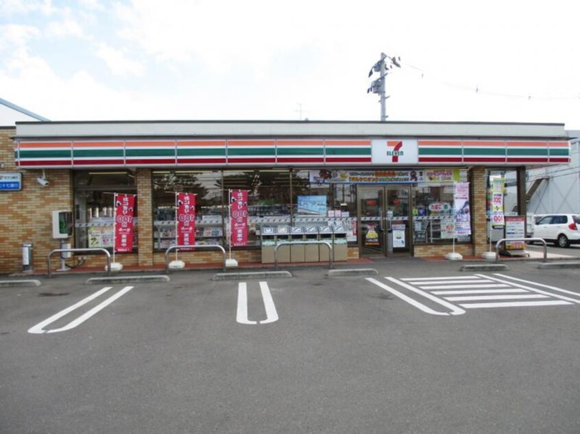 セブンイレブン福田町南1丁目店(コンビニ)まで450m ハイムプリオーレⅡ