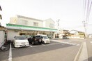 ファミリーマートウッディ南光台店(コンビニ)まで556m アーバンシティ南光台Ｃ棟