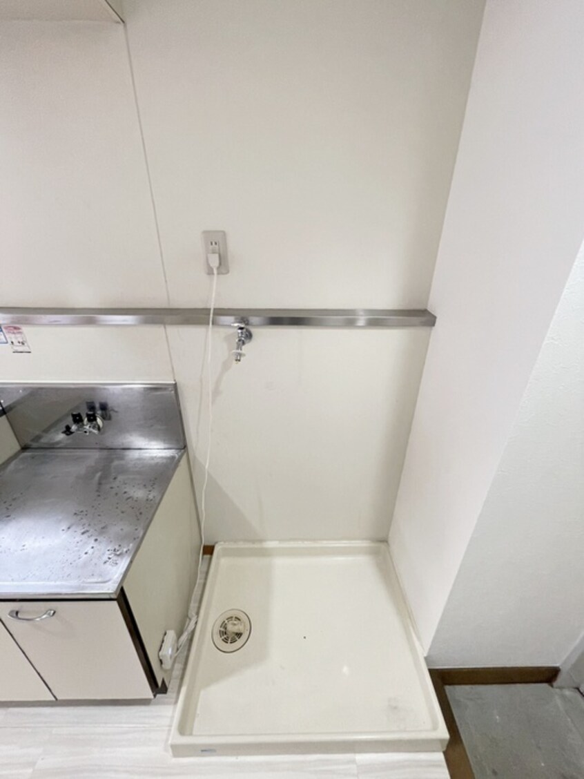 洗濯機置場 メゾン・ド・ノア壱番館