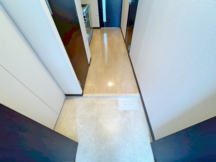 玄関 ｺﾝﾌｫｰﾄEXE新田ｽﾃｰｼｮﾝ