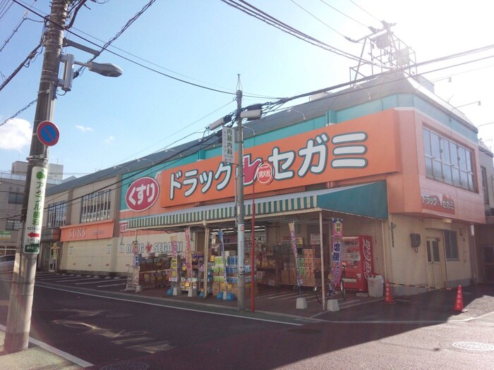 ドラッグセガミ庚午店(ドラッグストア)まで400m 芳寿園ビル