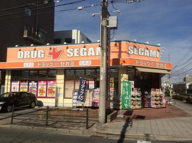 ドラッグセガミ内代店(ドラッグストア)まで119m※ドラッグセガミ内代店 マンションサクセス－１