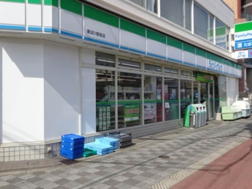 ファミリーマート東淀川駅北店(コンビニ)まで496m※ファミリーマート東淀川駅北店 グランMコート新大阪