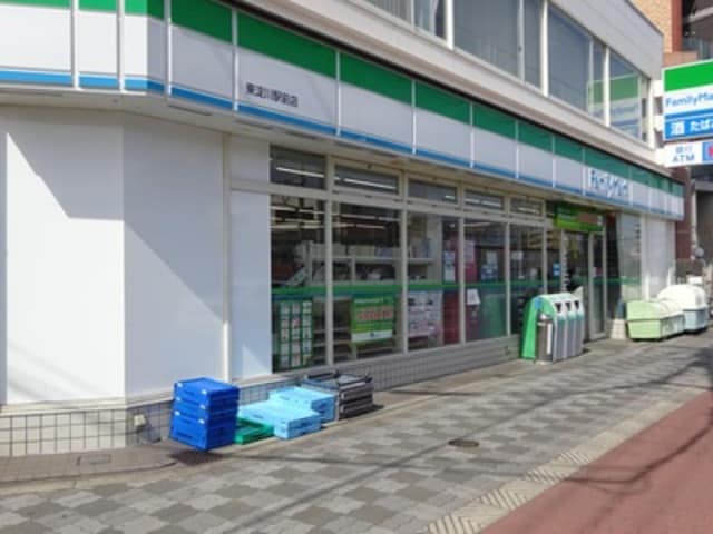 ファミリーマート東淀川駅北店(コンビニ)まで542m※ファミリーマート東淀川駅北店 JMRレジデンス新大阪