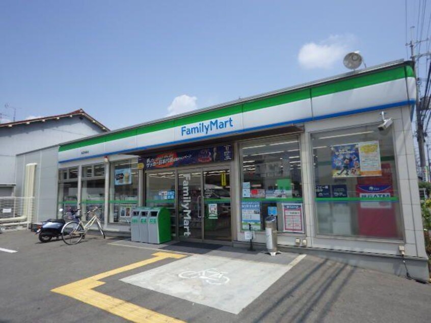 ファミリーマート高田神楽店(コンビニ)まで1315m 近鉄大阪線（近畿）/大和高田駅 徒歩10分 1階 築29年