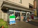 ファミリーマートラグザ大阪店(コンビニ)まで109m ラグザ大阪レジデンス