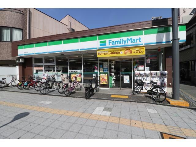 ファミリーマート西野田店(コンビニ)まで88m ユニハイム福島野田レジデンス