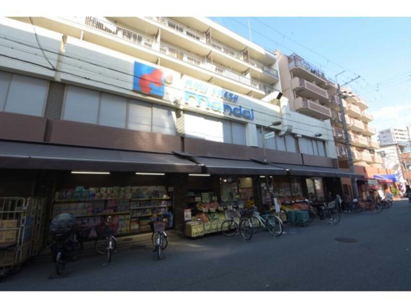 万代塚本店(スーパー)まで800m レジュールアッシュ塚本レジデンス