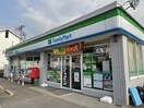 ファミリーマート日進岩根店(コンビニ)まで884m ゴルフランド