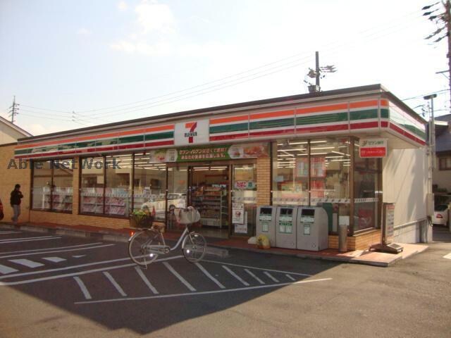 セブンイレブン名古屋鳴海町薬師山店(コンビニ)まで405m ルミナスＢ