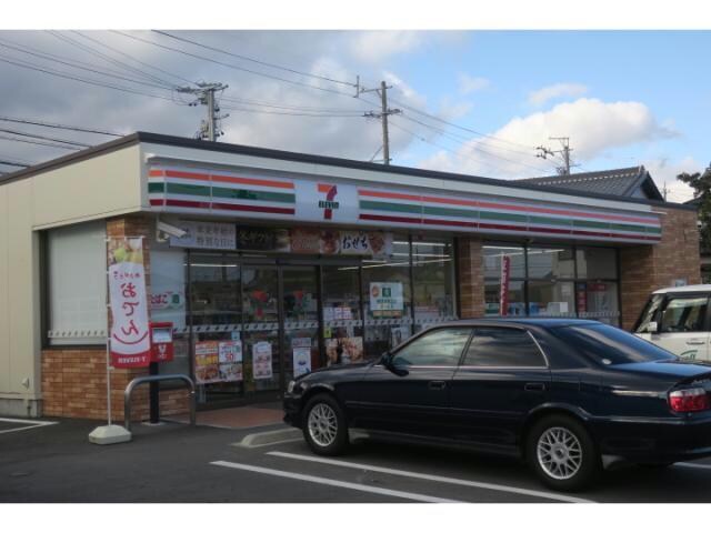 セブンイレブン亀山川崎町店(コンビニ)まで1390m ソレアードKⅢ　A