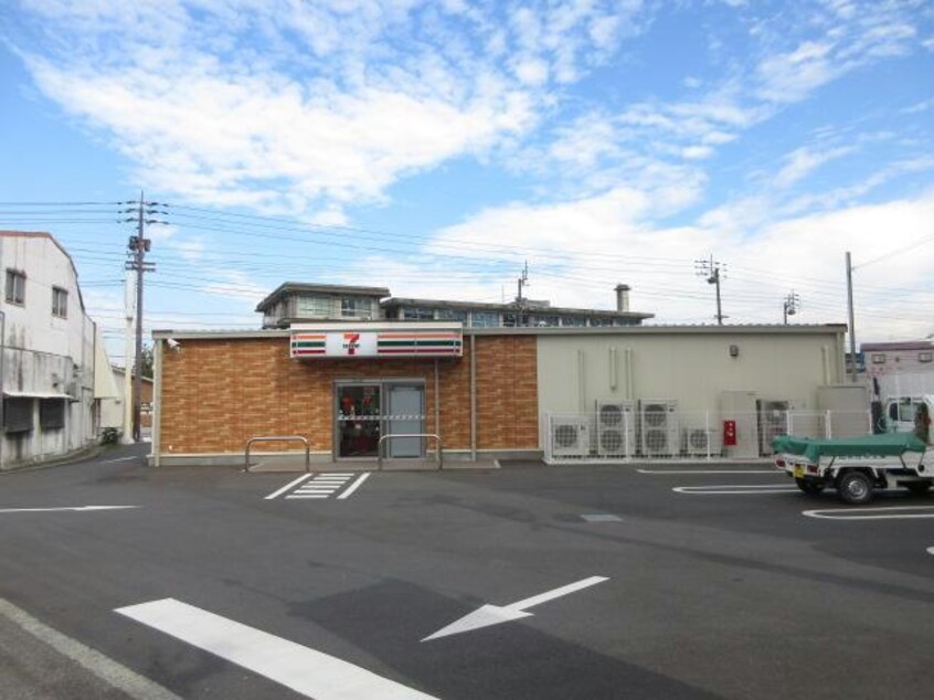 セブンイレブン西条神拝店(コンビニ)まで402m ヴィラ・サンライズ