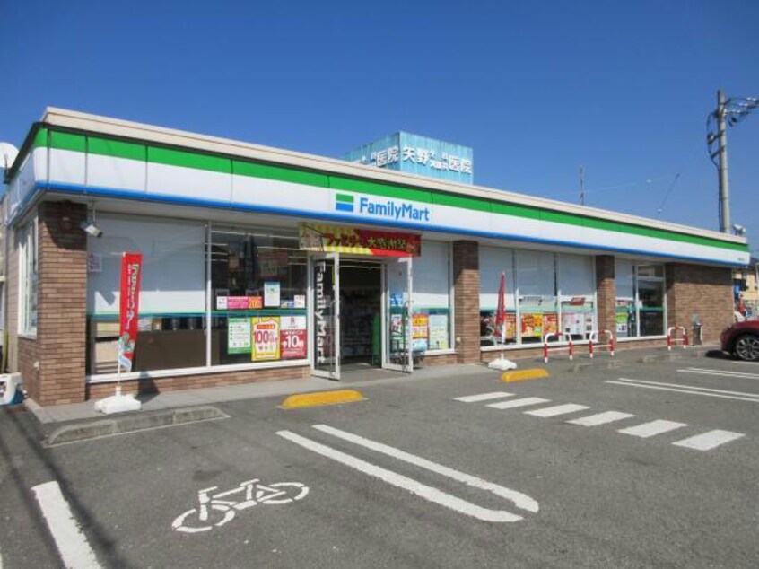 ファミリーマート西条古川店(コンビニ)まで497m ニッセキハイツ古川