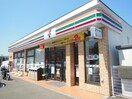 セブンイレブン三里塚店(コンビニ)まで596m ﾊﾟｰﾈﾙﾊｲﾂA棟