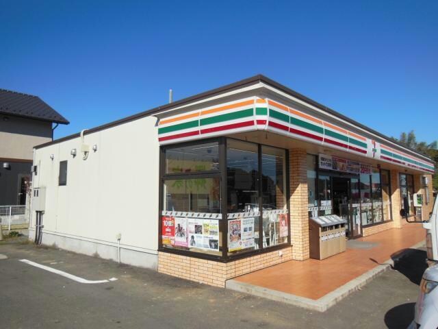 セブンイレブン成田不動ヶ岡店(コンビニ)まで1061m 石毛ﾊｲﾂ