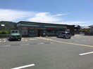 ファミリーマート浦富インター店(コンビニ)まで1369m グリュッククレーA