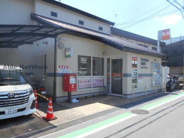 富田林西口郵便局(郵便局)まで407m ローレルハイツ