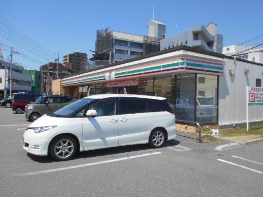 セブンイレブン富田林西口店(コンビニ)まで457m プラシージュ