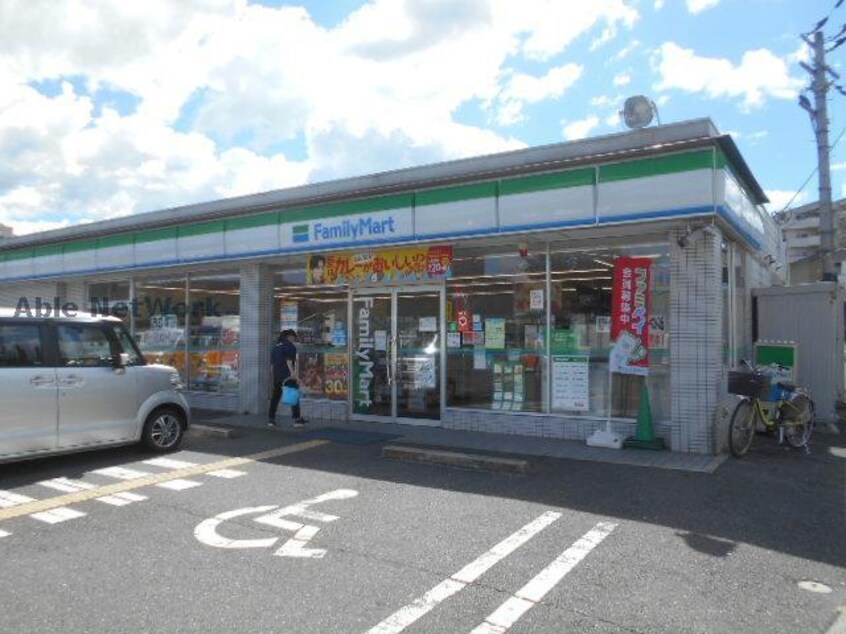 ファミリーマート河内長野市町店(コンビニ)まで1003m Newdorf壱番館