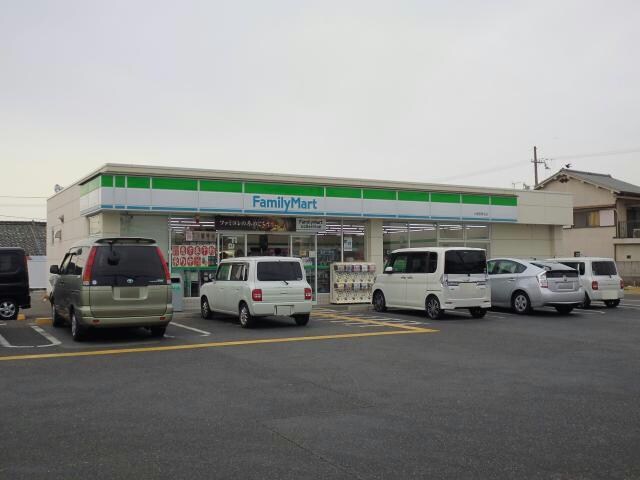 ファミリーマート小浦忠岡北店(コンビニ)まで750m ＮテラスⅣ