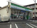 ファミリーマート岡山つしま西坂店(コンビニ)まで154m ウッディハイツ