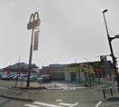 マクドナルド岡山西バイパス店(その他飲食（ファミレスなど）)まで711m サニーコスモⅡ