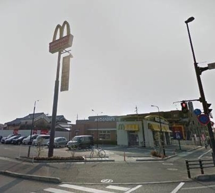 マクドナルド岡山西バイパス店(その他飲食（ファミレスなど）)まで711m サニーコスモⅡ