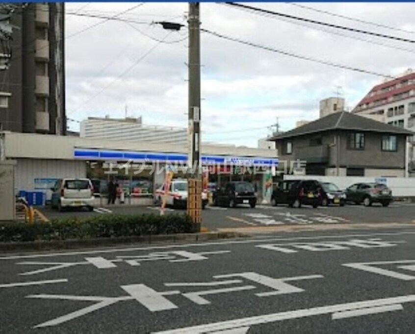 ローソン岡山門田屋敷店(コンビニ)まで197m コーポ門田屋敷