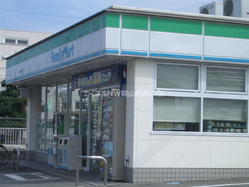 ファミリーマート岡山弓之町店(コンビニ)まで228m フローリアンコート弓之町