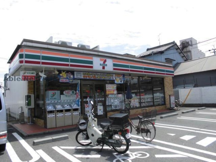 セブンイレブン江南駅北店(コンビニ)まで425m ハピネス・スクエア