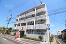 アルファ西古松の外観
