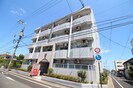 アルファ西古松の外観