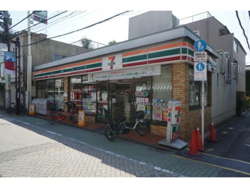 セブンイレブン足立千住3丁目店(コンビニ)まで321m デュオメゾン北千住駅前