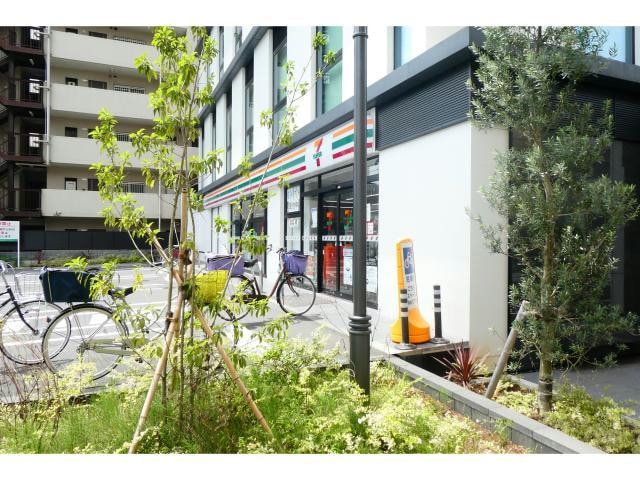 セブンイレブン足立加平1丁目店(コンビニ)まで395m エクセラン北綾瀬