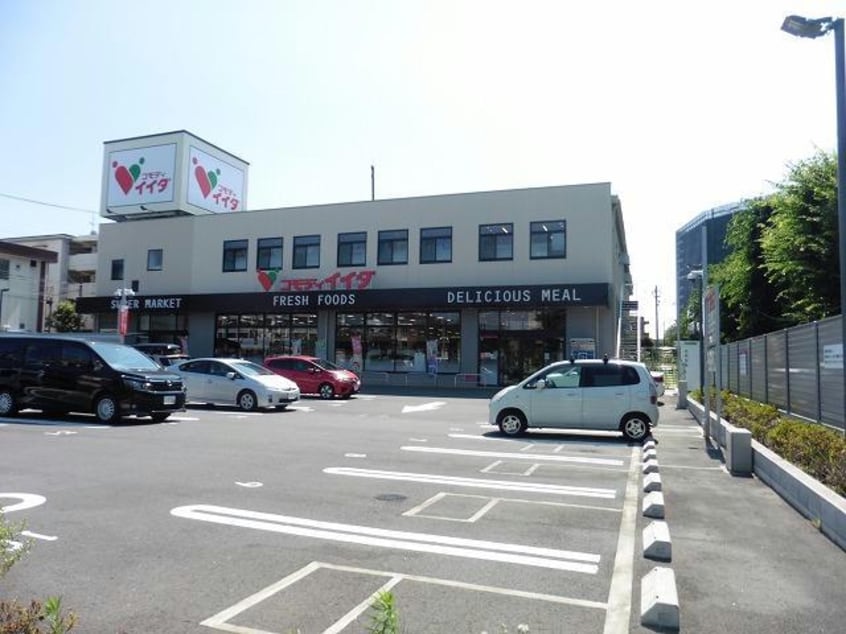コモディイイダ金町店(スーパー)まで446m カーサ柴又