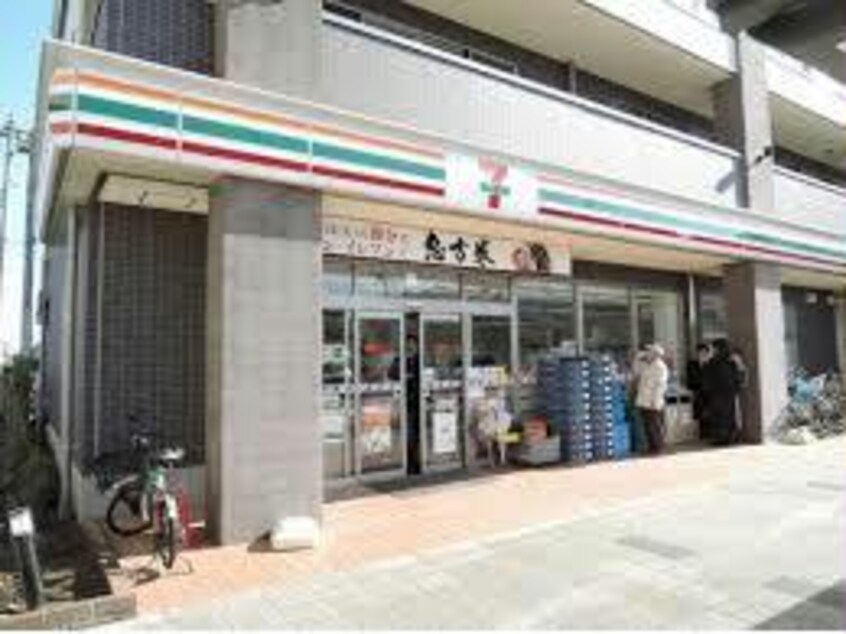 セブンイレブン飯山満駅前店(コンビニ)まで257m Mi casa Bella