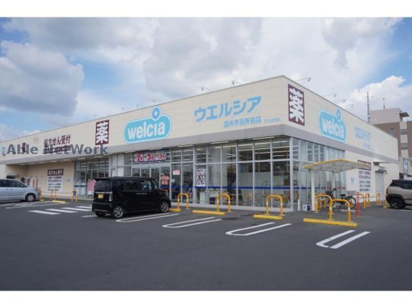 ウエルシア袋井市役所前店(ドラッグストア)まで428m マンションマーレ
