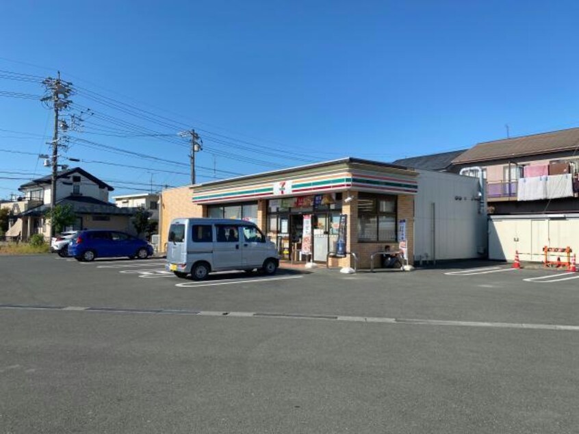 セブンイレブン磐田堀之内店(コンビニ)まで704m ウエスト・テール　ミュー