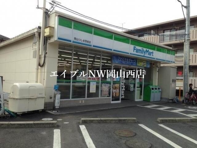 ファミリーマート岡山つしま西坂店(コンビニ)まで154m ウッディハイツ