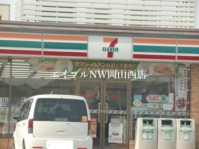 セブンイレブン岡山白石店(コンビニ)まで608m コーポラストピアⅡ番館