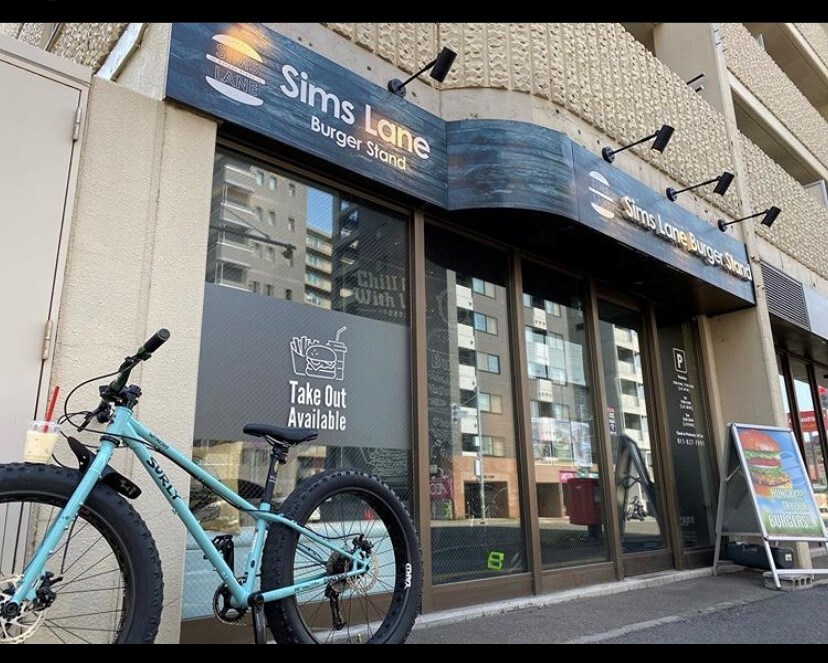 シムズレーンバーガースタンド(その他飲食（ファミレスなど）)まで65m ピオネロ月寒