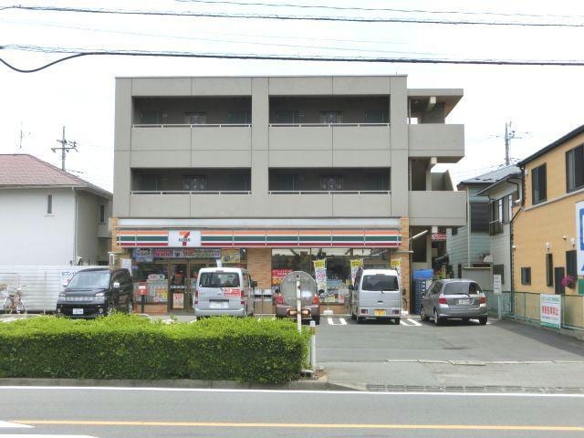 セブンイレブン鶴ケ島駅西口店(コンビニ)まで248m ルネス　エスポワール