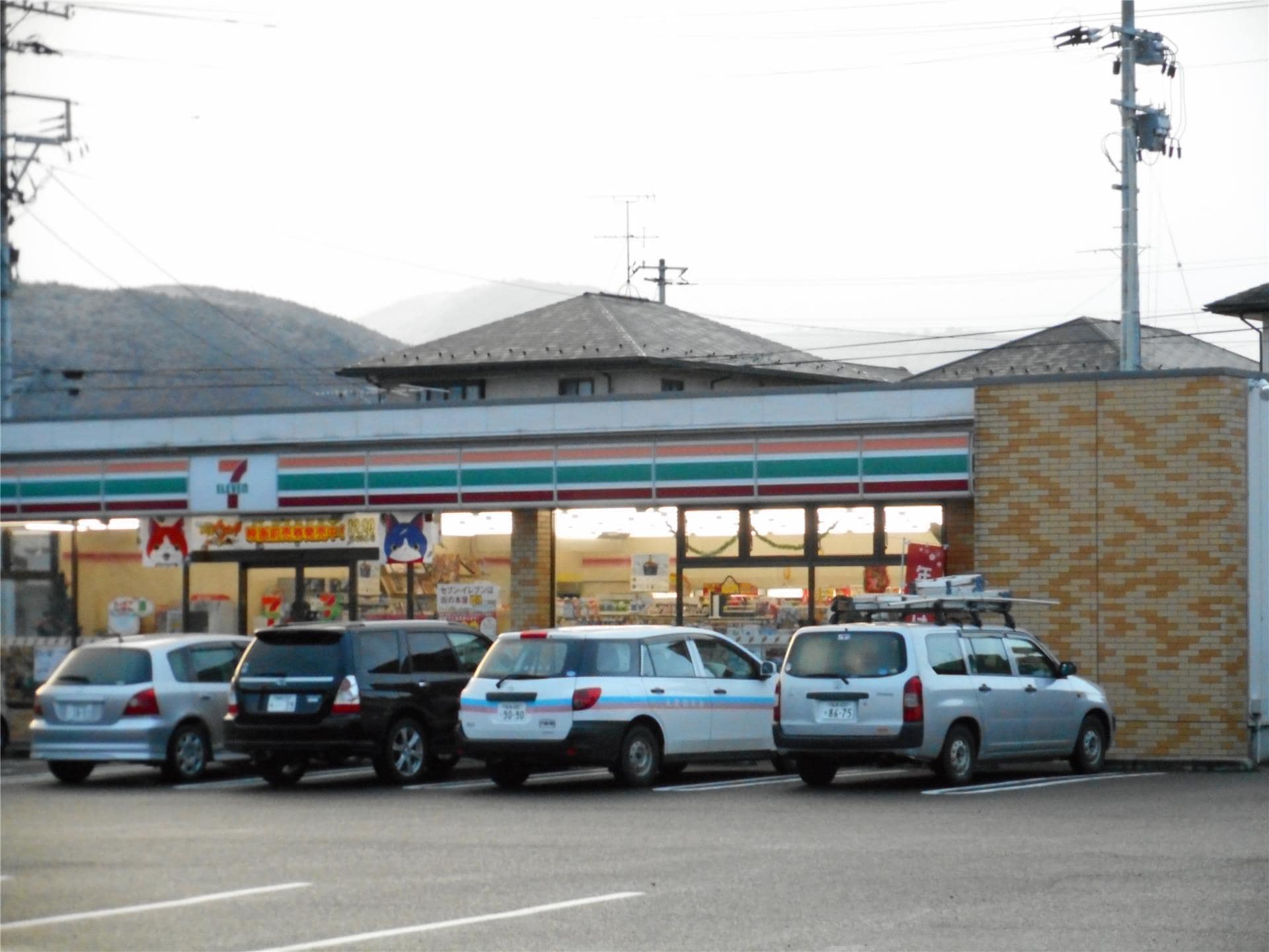 セブンイレブン飯坂八景店(コンビニ)まで355m リバーサイド月崎A