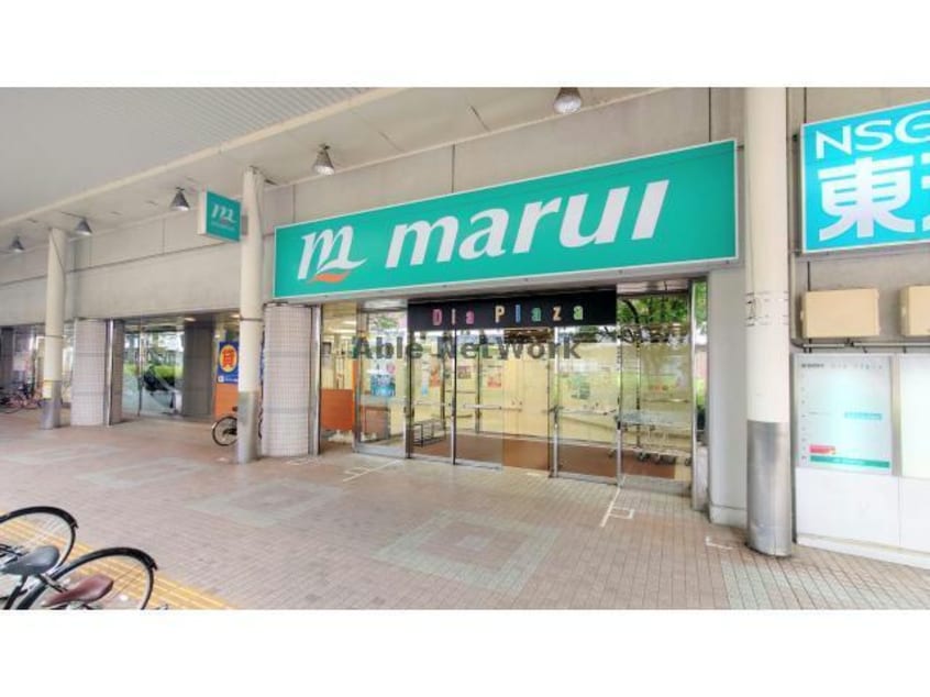 スーパーマルイ長岡駅前店(スーパー)まで581m ベルミーユ