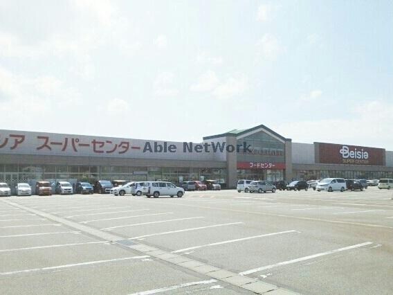 ベイシア小千谷店(スーパー)まで1158m ユーソニアン・三仏生A