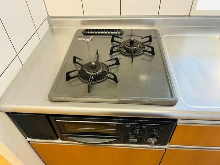 備え付け2口ガスコンロ 大分バス（大分市）/桑原下 徒歩1分 2階 築11年