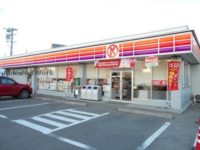 ファミリーマート犬山上野店(コンビニ)まで858m 日比野マンション